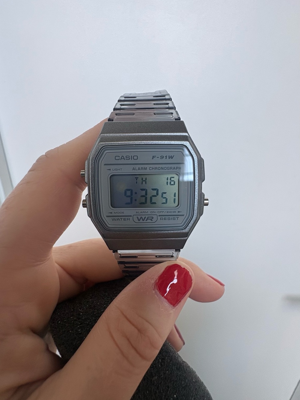 Casio silver digital watch with metal bracelet